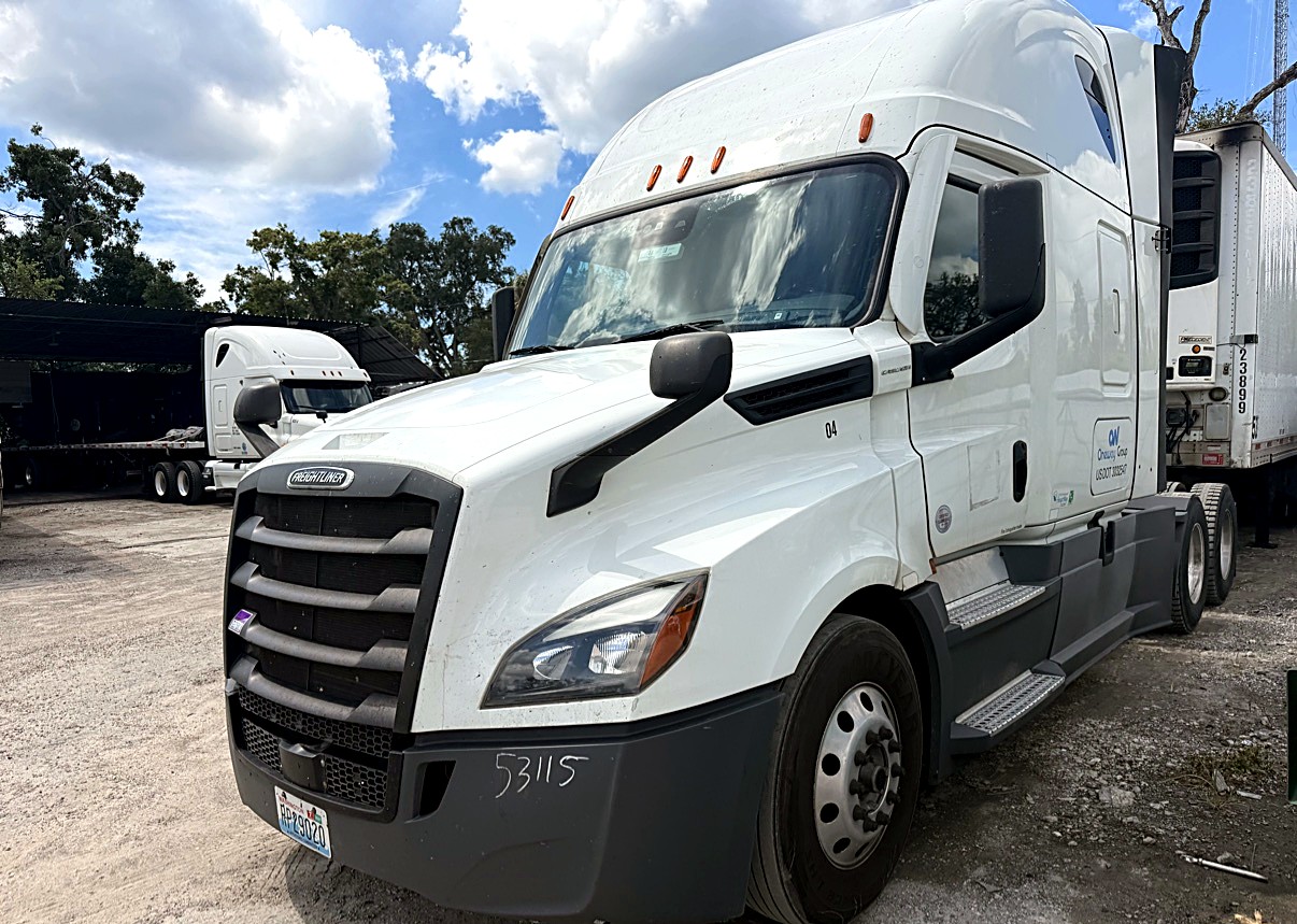 Oneway Group white Freightliner Cascadia, unit 04, parked in the yard
